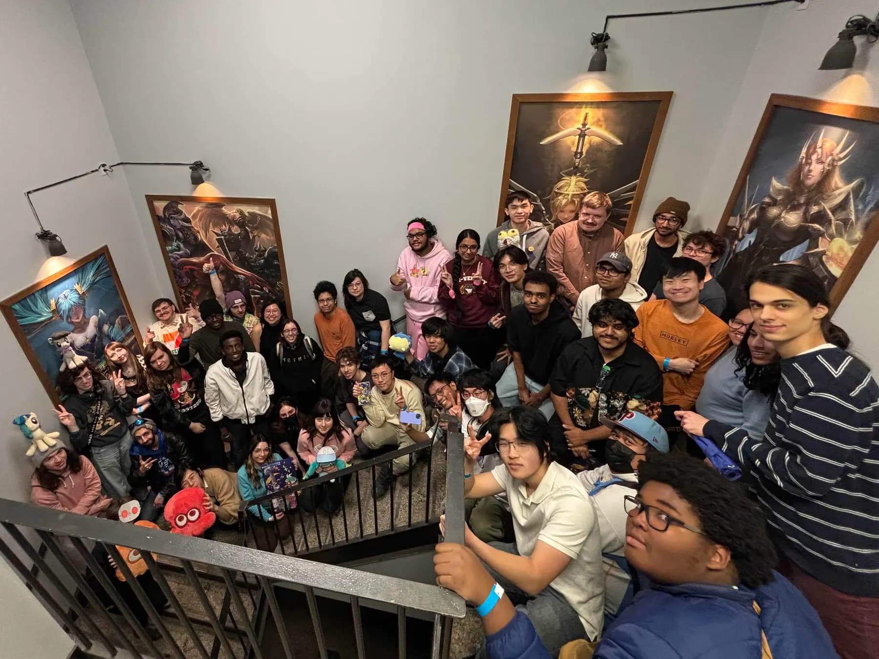 The Torontoroka crowd gathered on the venue stairwell for a group photo